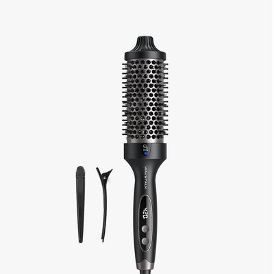 Black hair styling tool with attachments on a white background